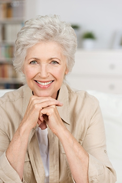 A senior woman smiling